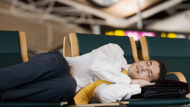 businessman-sleeping-airport-78770981-small.jpg
